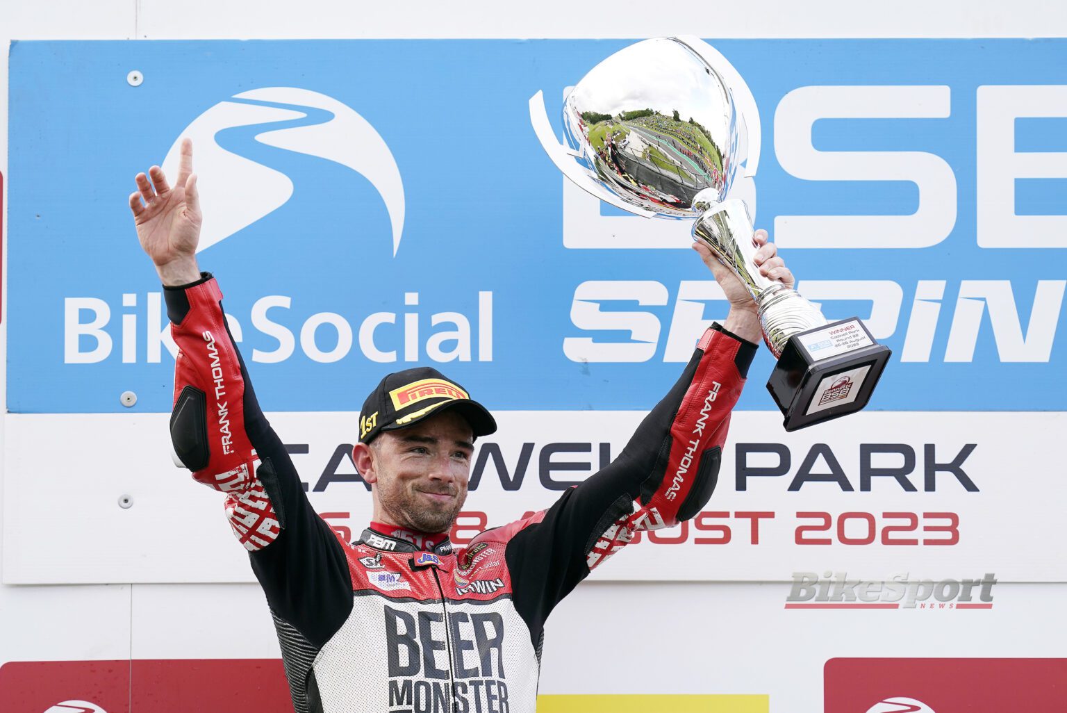 Glenn Irwin, BeerMonster Ducati, Ducati Panigale V4 R, 2023 BSB, Cadwell Park, portrait, podium, celebration [credit - Tim Keeton Impact Images]